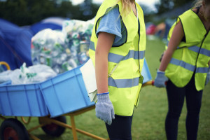 Young women picking up bottles after a festivalhttp://195.154.178.81/DATA/shoots/ic_782678.jpg